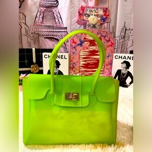 GUC💗
Sondra Roberts Neon Green bag.